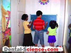 A blackboard keeps children busy